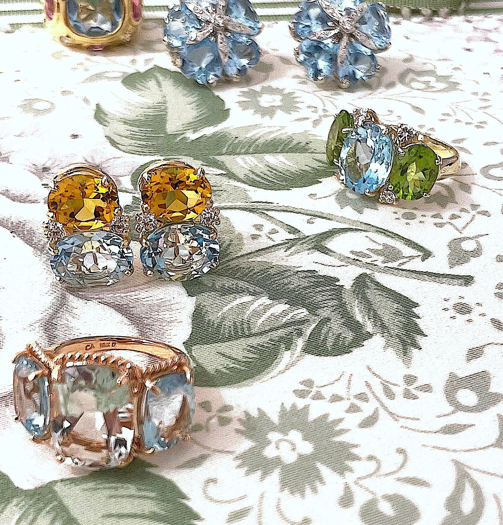 18kt Rose Gold Green Amethyst and Blue Topaz Three Stone Ring with Rope Twist Border